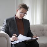 man looking over documents